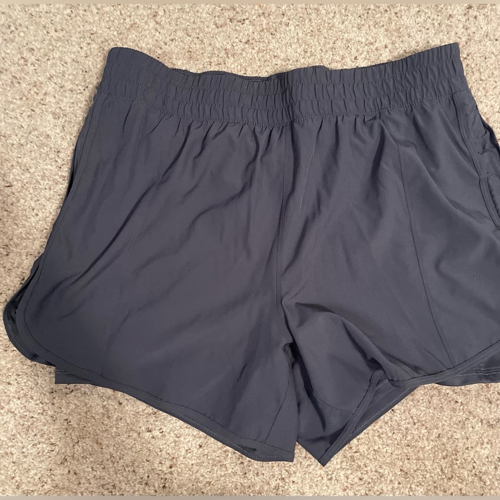 Athletic shorts with bike shorts under